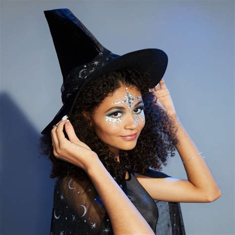 Unlock the power of the stars with a witch hat adorned in astral symbols